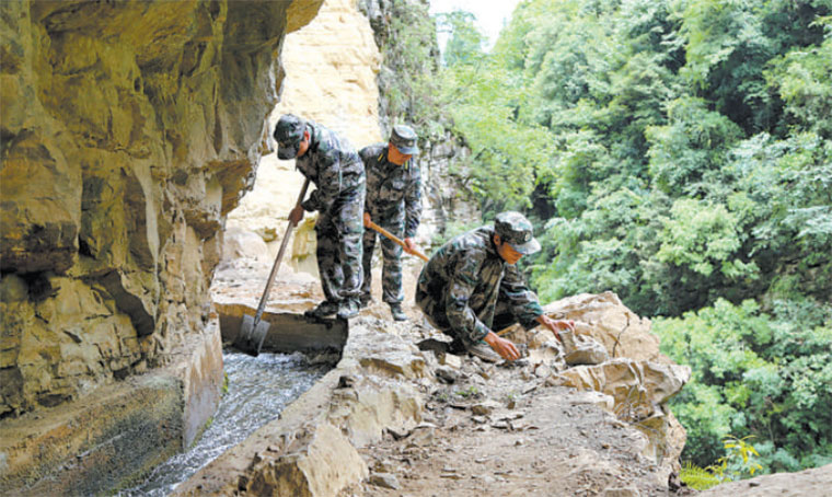 從絕壁開(kāi)渠到鄉村振興，幾代退役軍人和民兵骨干接力奮斗